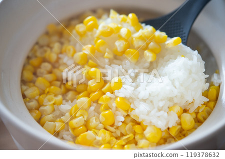 Corn rice cooked in a clay pot Corn rice cooked in a clay pot 119378632