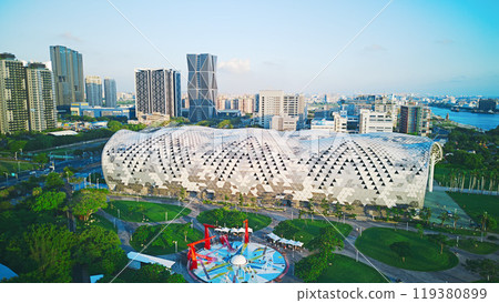 Kaohsiung, Taiwan - August 23, 2024: Aerial view of Kaohsiung Exhibition Center. Kaohsiung, Taiwan - August 23, 2024: Aerial view of Kaohsiung Exhibition Center. 119380899