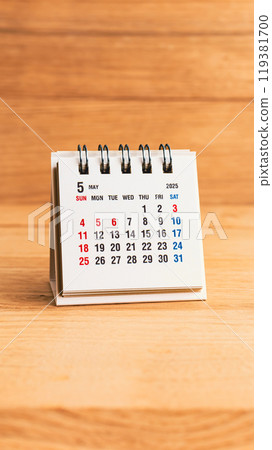 May 2025 calendar on wood background 119381700