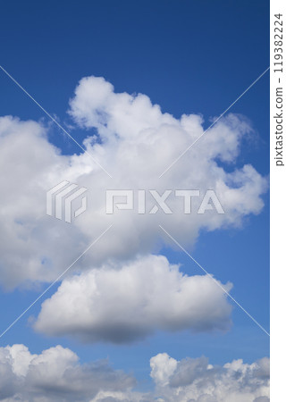 White cumulus clouds forming on vivid blue sky White cumulus clouds forming on vivid blue sky 119382224