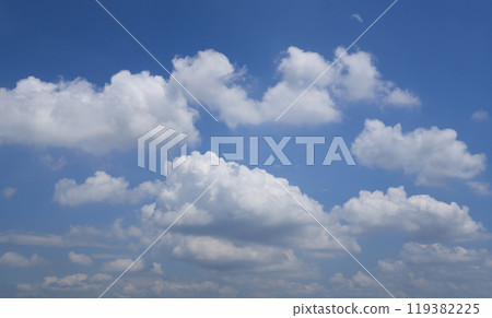 Beautiful blue sky with cumulus clouds forming on sunny day Beautiful blue sky with cumulus clouds forming on sunny day 119382225