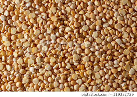 Uncooked Polished Split Peas Background 119382729