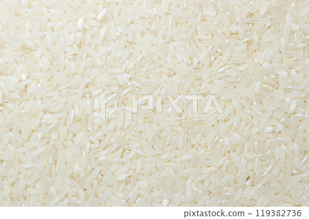Dry Uncooked White Rice Background Dry Uncooked White Rice Background 119382736