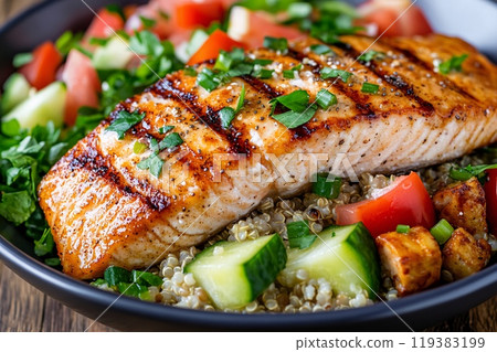 Delicious Grilled Salmon on Quinoa with Fresh Vegetables and Herbs 119383199