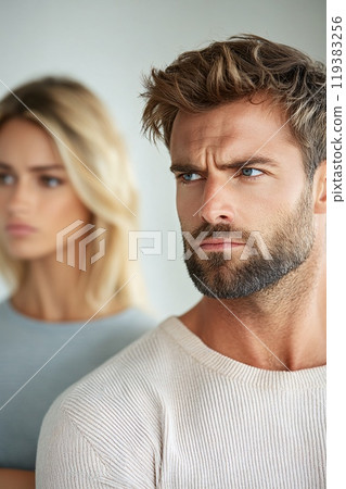Couple in Conflict: Tense and Emotional Moment Captured Indoors 119383256