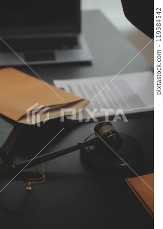 Law theme, gavel or mallet of the judge, lawyer enforcement officers, evidence-based cases taken into account in the court abount business, legislation. 119384542