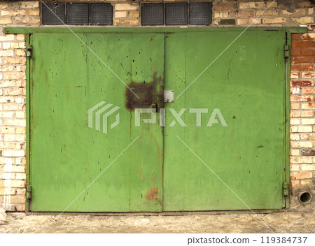 old metal door to the car garage 119384737