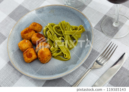 Albondigas with pasta - Spanish meatballs, with ingredients: flour, onion, garlic 119385143