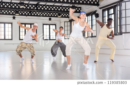Dancers training movements in ballroom Dancers training movements in ballroom 119385803