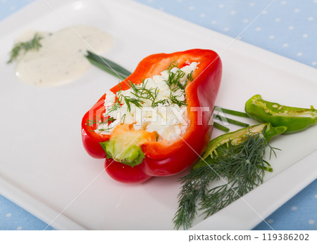 Photography of plate with pepper stuffed with brynza Photography of plate with pepper stuffed with brynza 119386202