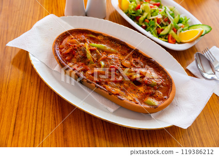 Izmir kofte, turkish dish of spicy meatballs Izmir kofte, turkish dish of spicy meatballs 119386212