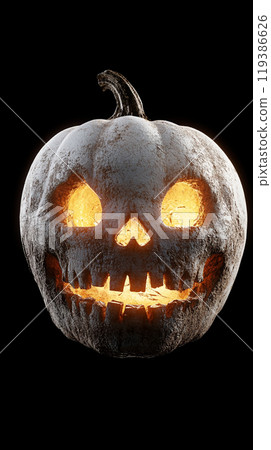 A pumpkin with a skull on it is lit up with a light A pumpkin with a skull on it is lit up with a light 119386626