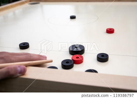 Novus table, cue in hand and novus dice, game with hitting the target. Black and red dice 119386797