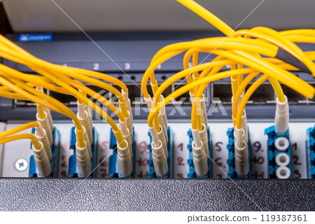 fiber optic cables connected into main data switch 119387361