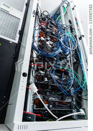 network cables connected into server inside data center 119387382