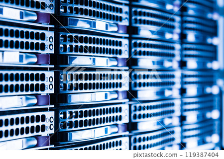 Array of data storage hard drives in internet data center 119387404