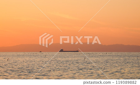 Sunset over the sea 119389882