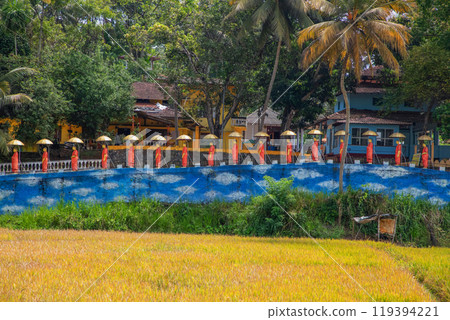 row of Buddhist monk statues in Dambulla row of Buddhist monk statues in Dambulla 119394221