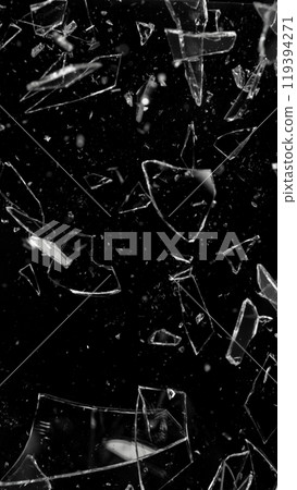 Close-up of shattering glass on black background , freeze motion Close-up of shattering glass on black background , freeze motion 119394271