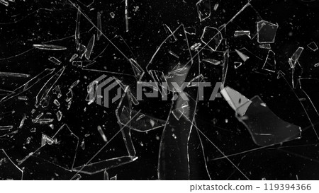 Close-up of shattering glass on black background , freeze motion 119394366
