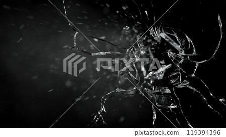Close-up of gunshot through the glass, shattering against the black background 119394396