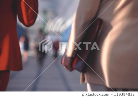 People's blurred motion in the city background People's blurred motion in the city background 119394832