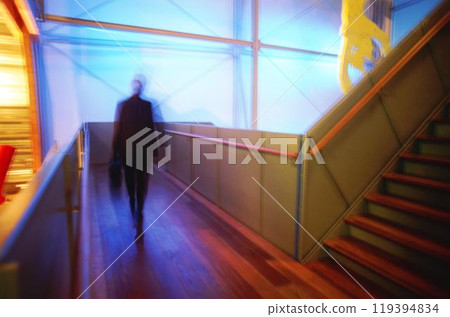 People's blurred motion in the city background People's blurred motion in the city background 119394834