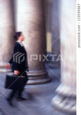 People's blurred motion in the city background People's blurred motion in the city background 119394867