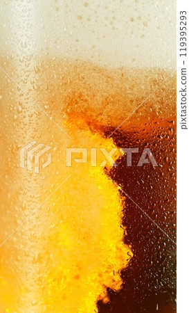Closeup of beer bubbles in a glass. Closeup of beer bubbles in a glass. 119395293