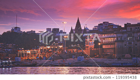 Varanasi, India. Hundreds Of Tourists And Locals Gather On Boats To Watch Fire Ceremony Or Puja At Assi Ghat. Ganga Maha Aarti Ceremony. Traditional Ganga Aarti In Varanasi. Cinematic Camera Movement 119395438