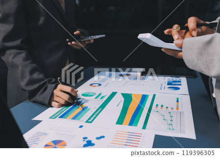 Team of business people are meeting to analyze data for marketing plan,Market research reports and income statistics, Financial and Accounting concept. 119396305