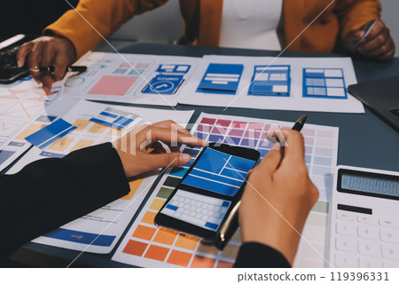 The designer team is designing the uxui system to make the uxui system work well on new phones and support system updates. Website development concept UI UX front end designer The designer team is designing the uxui system to make the uxui system work well on new phones and support system updates. Website development concept UI UX front end designer 119396331