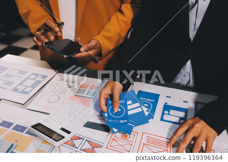 The designer team is designing the uxui system to make the uxui system work well on new phones and support system updates. Website development concept UI UX front end designer 119396364