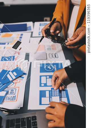 The designer team is designing the uxui system to make the uxui system work well on new phones and support system updates. Website development concept UI UX front end designer 119396365