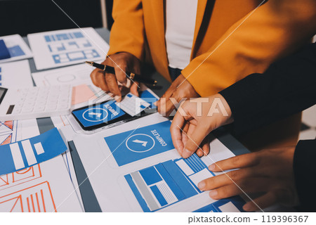 The designer team is designing the uxui system to make the uxui system work well on new phones and support system updates. Website development concept UI UX front end designer 119396367