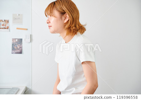 Woman opening cupboard, housewife, housework, cooking, cleaning up 119396558