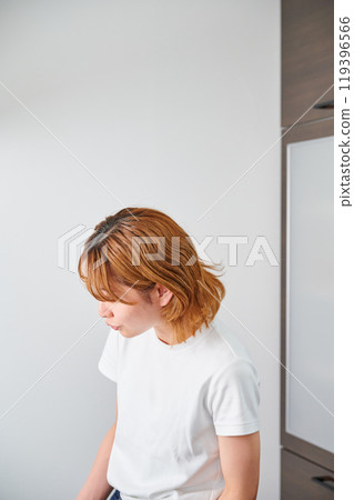 Woman opening cupboard, housewife, housework, cooking, cleaning up Woman opening cupboard, housewife, housework, cooking, cleaning up 119396566