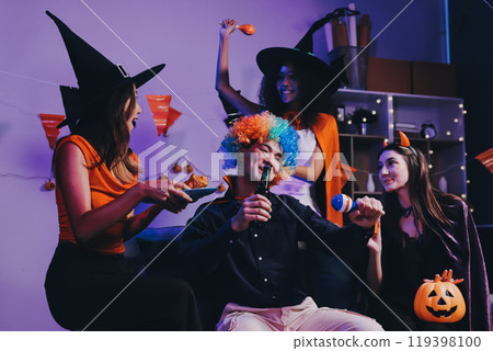 Joyful office Halloween party with coworkers in costumes, celebrating with drinks and laughter, fostering teamwork and festive spirit Joyful office Halloween party with coworkers in costumes, celebrating with drinks and laughter, fostering teamwork and festive spirit 119398100