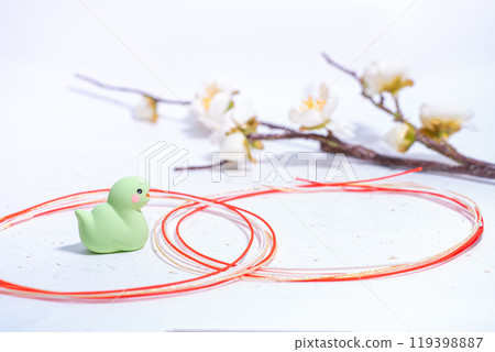 Celebrating the New Year, cute snake and New Year decorations Celebrating the New Year, cute snake and New Year decorations 119398887