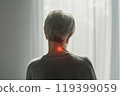 Elderly Woman Experiencing Neck Pain 119399059