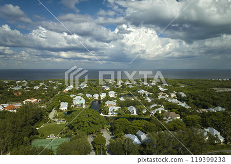 View from above of large residential homes in island small town Boca Grande on Gasparilla Island in southwest Florida. American waterfront houses in rural US suburbs 119399238