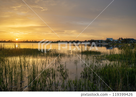 Lake sunset in Wellen park in North Port, Florida 119399426
