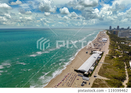 Panoramic view of Miami Beach urban landscape. South Beach high luxurious hotels and apartment buildings Panoramic view of Miami Beach urban landscape. South Beach high luxurious hotels and apartment buildings 119399462