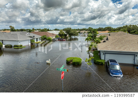 Flooding in Florida caused by tropical storm from hurricane Debby. Suburb houses in Laurel Meadows residential community surrounded by flood waters in Sarasota. Aftermath of natural disaster 119399587