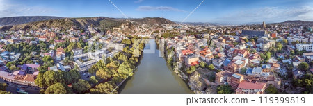 Drone panorama of Tbilisi, Georgia, with the Kura River at sunrise showcasing the cityscape 119399819