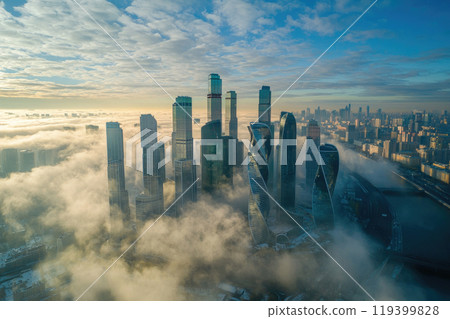 Aerial view of fog between skyscrapers in a big city Aerial view of fog between skyscrapers in a big city 119399828