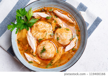 Matzoh ball and chicken soup 119400166