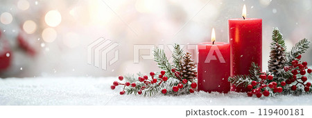 Red candles with winter Christmas decorations with snow background 119400181