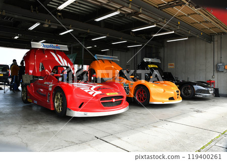 Car maintenance in the VITA racing car pit area Car maintenance in the VITA racing car pit area 119400261