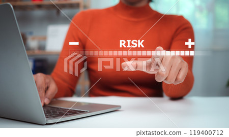 Person use laptop with virtual icon of Risk analysis in business decisions, Risk management concept, Risk control and management strategies for risky businesses, Financial risk management concept. Person use laptop with virtual icon of Risk analysis in business decisions, Risk management concept, Risk control and management strategies for risky businesses, Financial risk management concept. 119400712